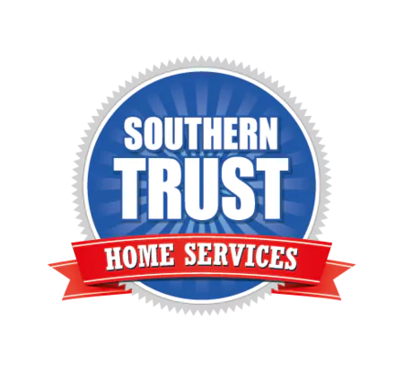 Logo Of Southern Trust Home Services Featuring A Blue Circular Background With The Name In White Letters And A Red Ribbon Stating &Quot;Home Services.