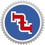 A Blue Circular Emblem With A Jagged Gray Border, Featuring A Stylized Red And White Pipe Design In The Center.